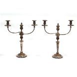 Property of a lady of title - a pair of 19th century Old Sheffield Plate three-light candelabra,