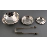 Property of a deceased estate - a bag containing four small silver items including a pierced dish,