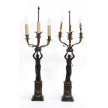 Property of a deceased estate - a pair of 19th century French patinated & gilt bronze three-light