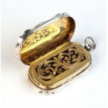 Property of a deceased estate - a Victorian silver shaped rectangular vinaigrette pendant, with