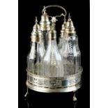 Property of a lady - a George III silver five-bottle cruet or condiment set, makers TI, London 1778,