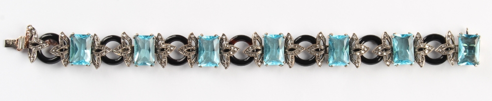 A rectangular cut zircon, diamond & black hoop link bracelet, 7.1ins. (18cms.) long (see