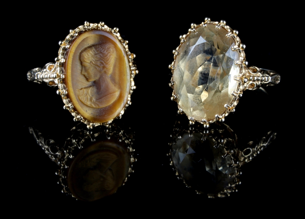 Property of a gentleman - a 9ct gold tiger's eye oval cameo ring, size P, approximately 5.6 grams;