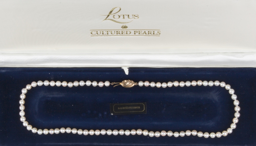 Property of a deceased estate - a boxed Lotus cultured pearl single row necklace, with 9ct gold