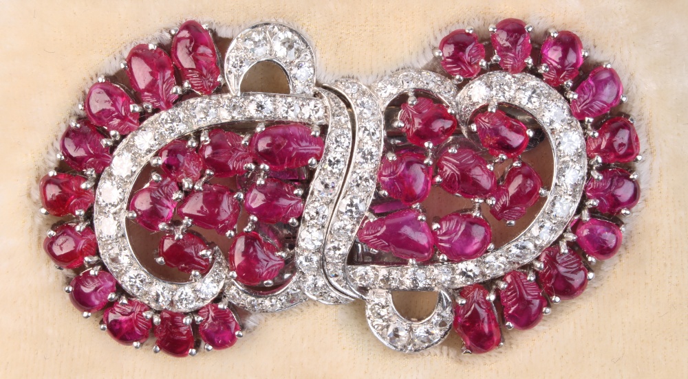 A fine pair of ruby & diamond clips, joining to form a brooch, set with thirty-five unheated Burmese