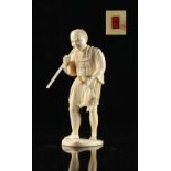 Property of a gentleman - a Japanese carved ivory okimono depicting a fisherman, Meiji period (