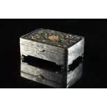 A Japanese silver & enamel rectangular box, Meiji period (1868-1912), the hinged cover decorated