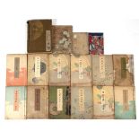 A set of twelve late 19th century Japanese illustrated softback books; together with four others (