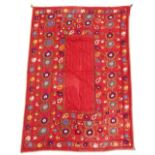 Property of a lady - an early 20th century susani, Uzbekistan, with brightly coloured flowers on a