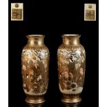 A large pair of Japanese Satsuma vases, Meiji period (1868-1912), painted with figures in