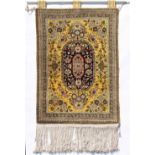 Property of a lady - a Persian part silk prayer mat, with flowers on a yellow ground, 33 by 22.5ins.