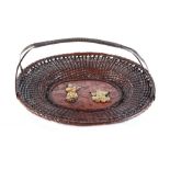 A Japanese mixed metal oval basket, decorated with two figures, 9.3ins. (23.6cms.) long (see