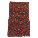 Property of a lady - an early 20th century Bokhara rug, with red ground, 77 by 45ins. (196 by