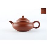 A Chinese Yixing teapot, early 20th century, impressed mark to inner rim of cover, 4.85ins. (12.