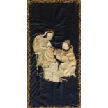 A rare 19th century Chinese embroidered navy blue silk panel depicting a concubine & eunuch, 55.9 by