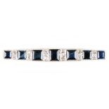 An Art Deco style sapphire & diamond bar brooch, the square cut sapphires weighing an estimated 2.