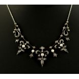 A 19th century rose cut diamond & pearl pendant necklace, the chain later, 17ins. (43cms.) long (see