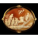 A good large oval shell cameo brooch depicting a horse drawn chariot & classical maidens, the