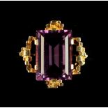 A modern 14ct yellow gold amethyst ring, the rectangular cut amethyst weighing an estimated 5.8