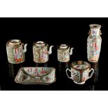 A group of six late 19th century Chinese Canton porcelain items including a vase with frill neck and