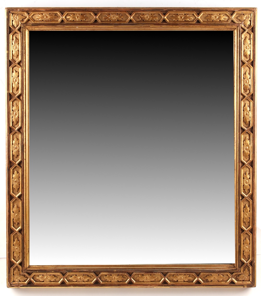 Property of a gentleman - an early 20th century carved giltwood rectangular framed mirror, with