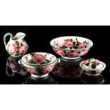 Property of a lady - a Wemyss pink roses four-piece toiletry set, the larger soapdish & jug