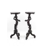 Property of a lady of title - a pair of late 19th century Venetian carved blackamoor torcheres or