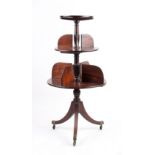 Property of a gentleman - an early 19th century Regency period mahogany three-tier drop-leaf dumb