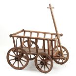 Property of a lady - an early 20th century wooden dog cart.
