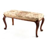 Property of a deceased estate - a Victorian walnut & upholstered rectangular topped long stool, with