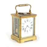 Property of a lady - a late 19th century French brass corniche cased carriage clock, striking on a