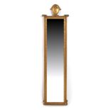 Property of a deceased estate - an early 20th century gilt rectangular framed narrow mirror, the