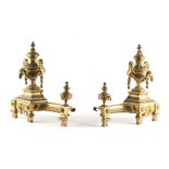 Property of a gentleman - a pair of late C19th French ormolu fender ends or chenets, with swag