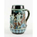Property of a lady - a late 19th / early 20th century Continental majolica mug or tankard, decorated