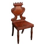 Property of a gentleman - an early 19th century Regency period mahogany hall chair, the design