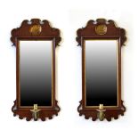 Property of a lady - a pair of George II style mahogany fretwork framed girandoles, each 24.5ins. (