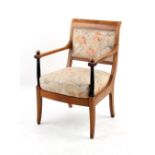 Property of a gentleman - a Biedermeier style fruitwood & ebonised fauteuil, 19th century (see