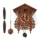 Property of a lady - a late 19th century Bavarian walnut parquetry & carved beechwood cuckoo