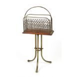 Property of a lady - an Edwardian oak & brass revolving magazine rack (see illustration).