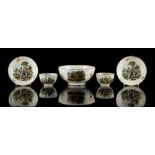 A pair of first period Worcester colour transfer printed tea bowls and saucers, decorated with