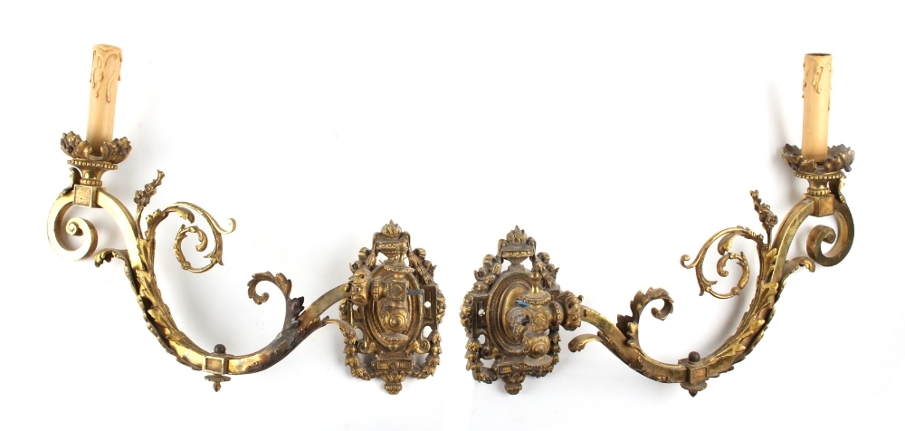 Property of a lady - a pair of Victorian brass foliate wall lights, each approximately 18ins. (45.