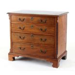 Property of a deceased estate - a small George III mahogany chest of four long graduated drawers,