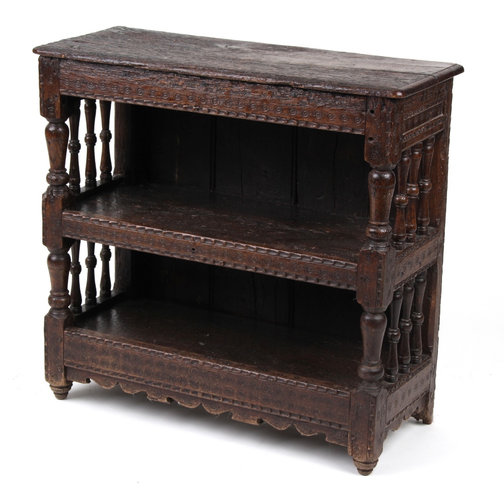 Property of a lady - a 17th century Charles I carved oak three-tier spindle wall cupboard, circa