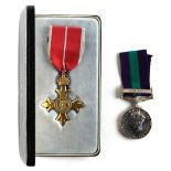 Property of a lady - medals - a boxed George VI MBE (military); together with a GSM with Malaya