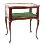 Property of a lady - an early 20th century mahogany bijouterie table, with four glazed drop-down
