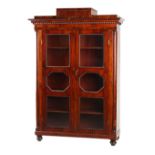 Property of a lady - a 19th century Russian or Baltic mahogany glazed two-door bookcase, 47.5ins. (