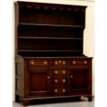 Property of a deceased estate - a George III oak two-part Welsh dresser, 63ins. (160cms.) wide (