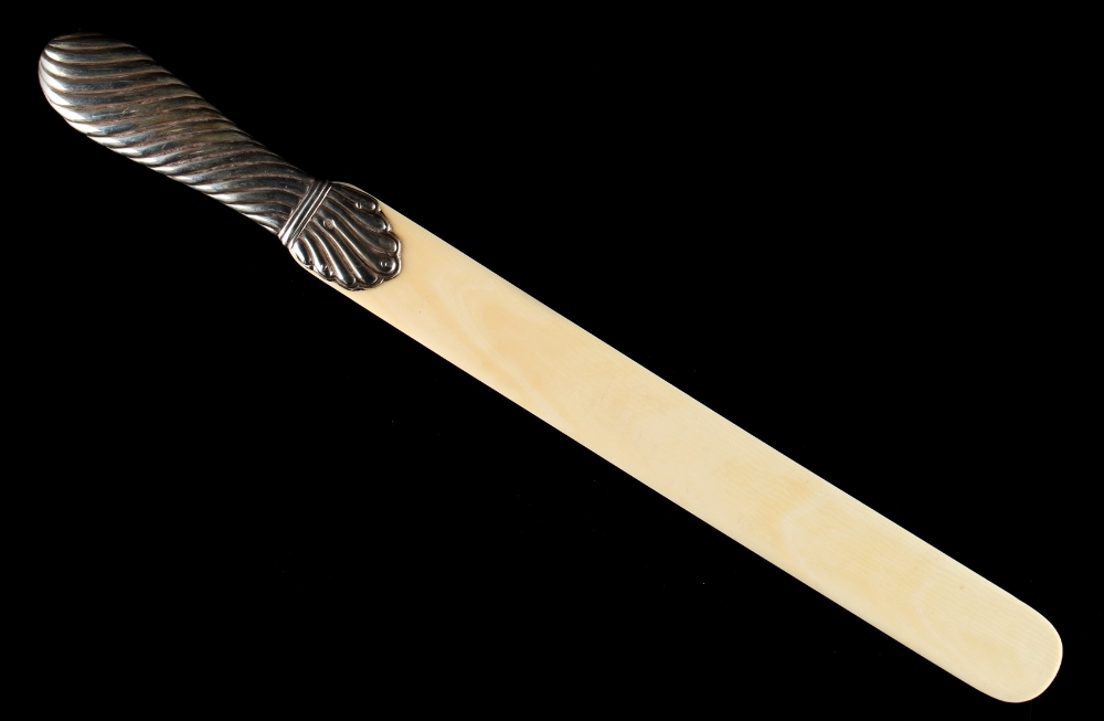 Property of a lady - a Victorian silver handled ivory paper knife, makers William Comyns, London