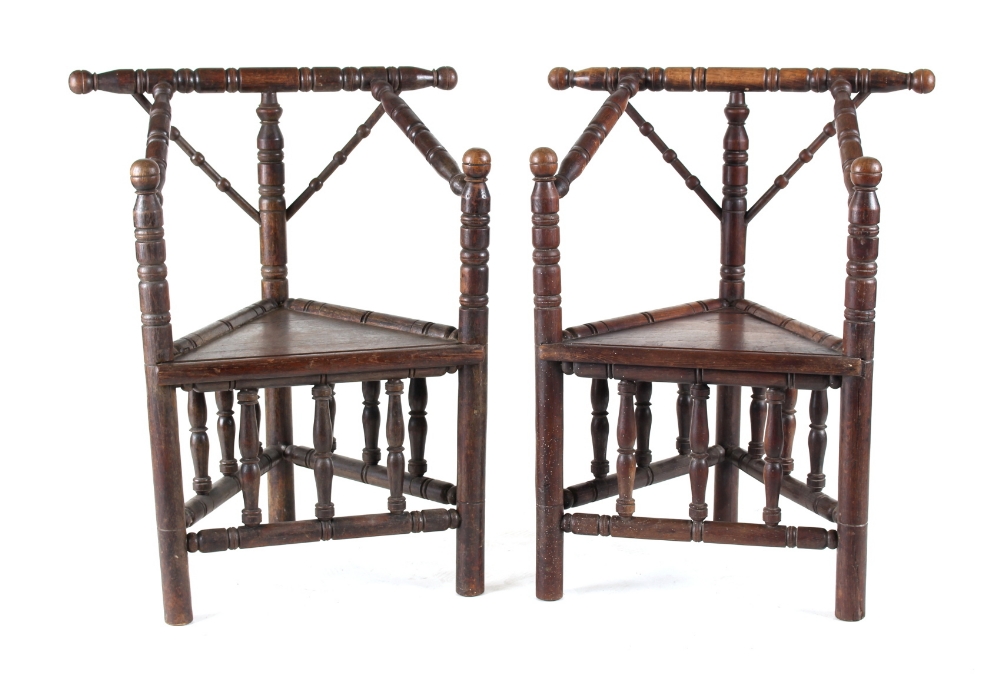 A pair of late Victorian oak turner's chairs (2) (see illustration).