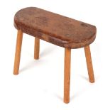 Property of a deceased estate - a burr oak rounded rectangular topped rustic stool, 19.5ins. (49.